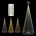 Tall LED cone Christmas tree light with a star and three smaller trees and a remote