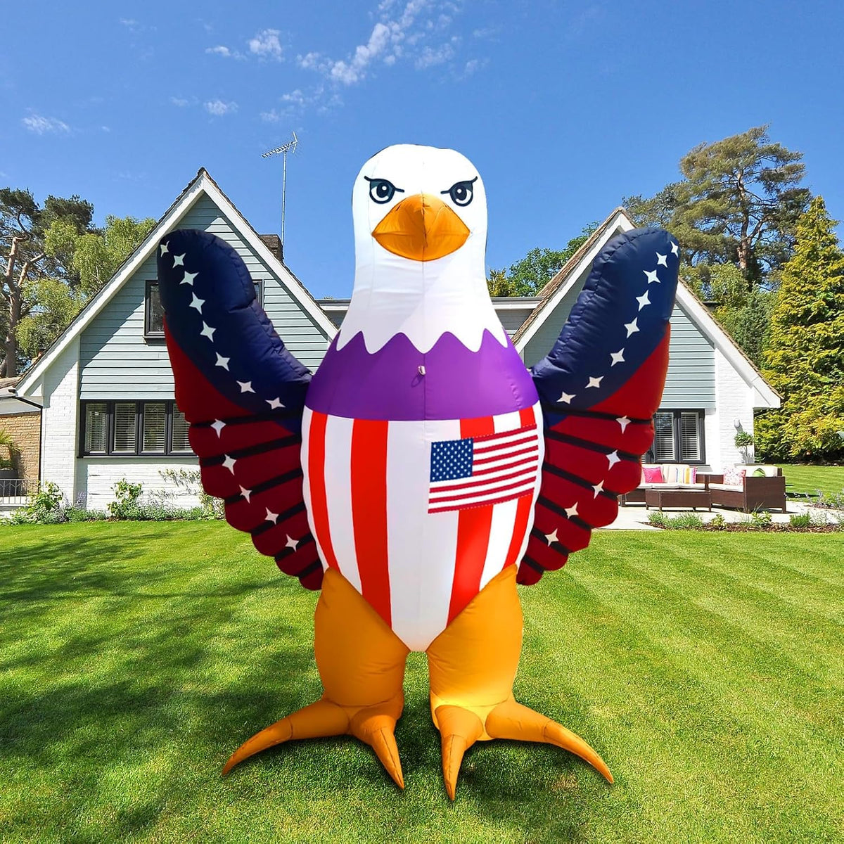 Bald eagle inflatable with red, white and blue wings and an American flag chest on a front lawn