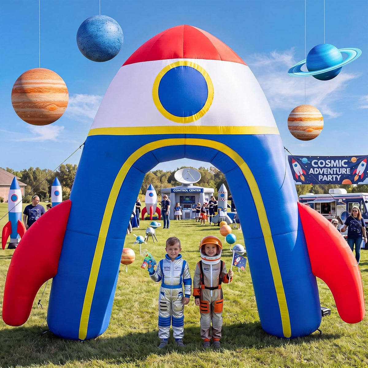 Red, white and blue rocket arch inflatable with planets overhead and kids in astronaut suits