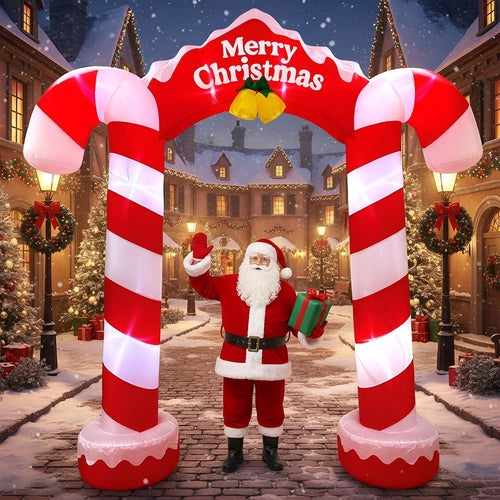 Candy cane arch inflatable with a Merry Christmas sign over a snowy street with Santa beneath